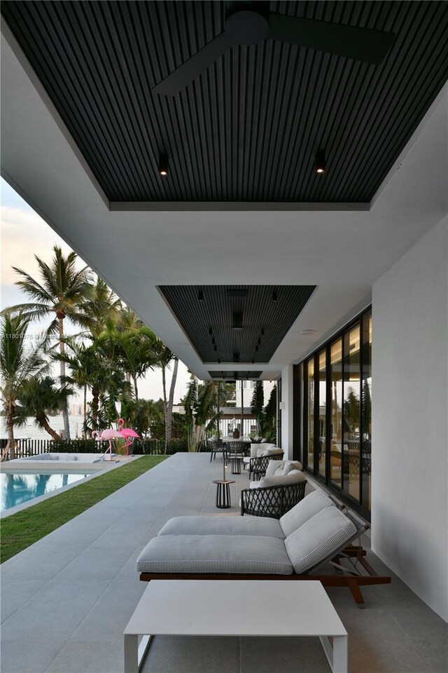 375 N Hibiscus Dr, Miami Beach, FL 33139 - view of patio / terrace with an outdoor pool, outdoor lounge area, and outdoor dining area