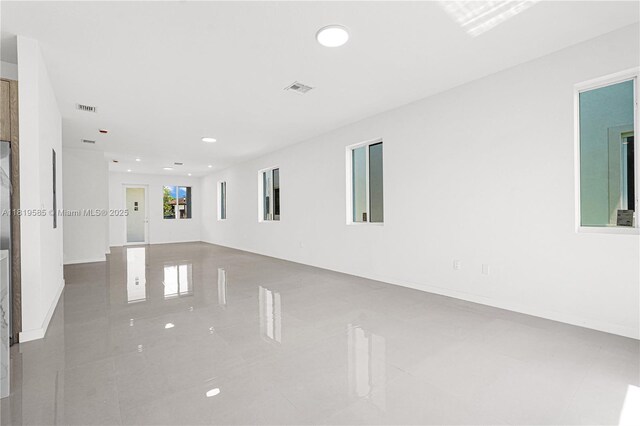 19446 SW 296th St Unit A, Homestead, FL 33030 - tiled spare room featuring recessed lighting and baseboards