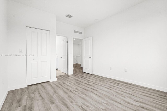 19446 SW 296th St Unit A, Homestead, FL 33030 - unfurnished bedroom with wood finished floors and baseboards