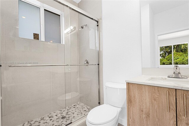 19446 SW 296th St Unit A, Homestead, FL 33030 - full bath with toilet, vanity, and a stall shower