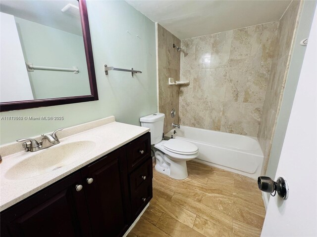 8511 NW 8th St Unit 103, Miami, FL 33126 - bathroom featuring vanity, tub / shower combination, and toilet