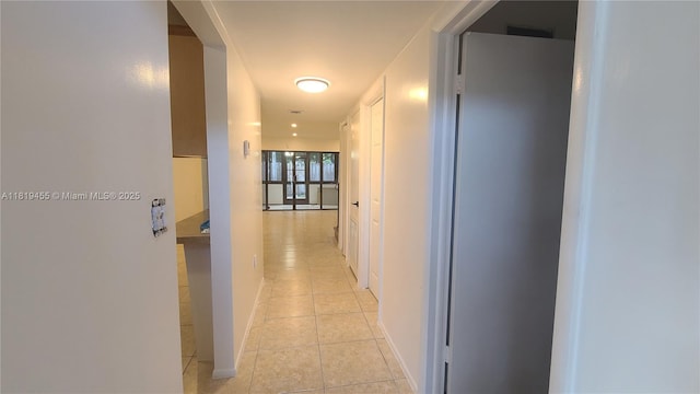 3321 Raleigh St Unit 3H, Hollywood, FL 33021 - hall with light tile patterned floors and baseboards