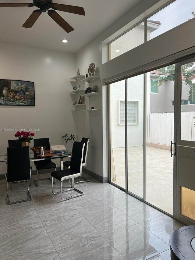 1120 Papaya St, Hollywood, FL 33019 - home office with a ceiling fan, recessed lighting, and light marble finish floors