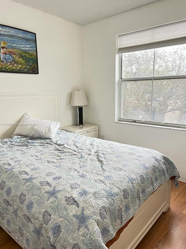 1120 Papaya St, Hollywood, FL 33019 - bedroom with wood finished floors