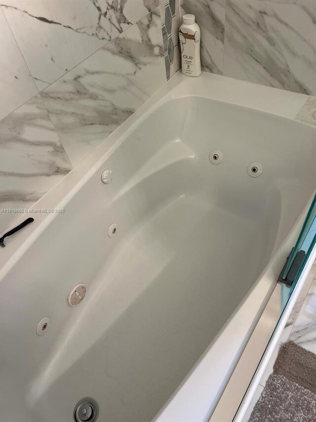 1120 Papaya St, Hollywood, FL 33019 - bathroom featuring a whirlpool tub