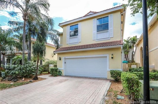1120 Papaya St, Hollywood, FL 33019 - mediterranean / spanish-style house with a tile roof and stucco siding