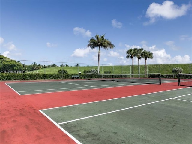 1120 Papaya St, Hollywood, FL 33019 - view of tennis court with community basketball court