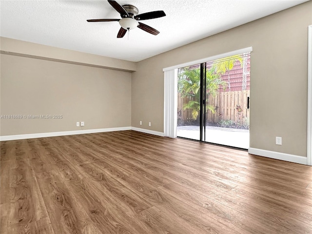 9920 NW 6th Pl Unit 9920, Plantation, FL 33324 - spare room with wood finished floors, ceiling fan, and a textured ceiling