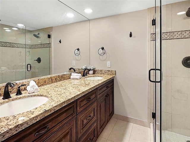 9920 NW 6th Pl Unit 9920, Plantation, FL 33324 - bathroom featuring a stall shower, tile patterned flooring, and double vanity