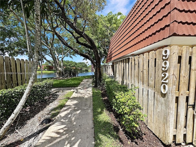 9920 NW 6th Pl Unit 9920, Plantation, FL 33324 - view of property exterior with a water view