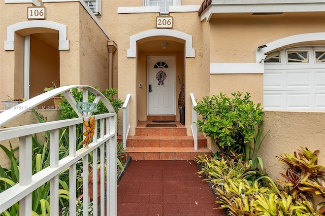 14621 Balgowan Rd Unit 206-3, Miami Lakes, FL 33016 - entrance to property featuring stucco siding and a garage