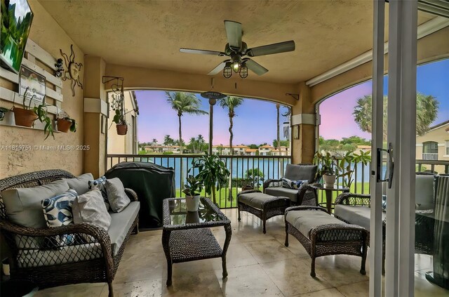 14621 Balgowan Rd Unit 206-3, Miami Lakes, FL 33016 - sunroom featuring a water view, ceiling fan, and outdoor lounge area
