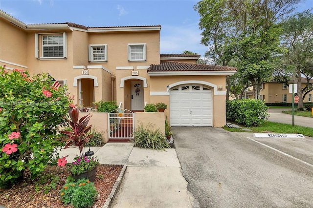 14621 Balgowan Rd Unit 206-3, Miami Lakes, FL 33016 - view of front of home with stucco siding and a tiled roof