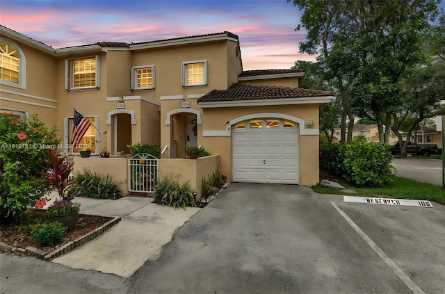 14621 Balgowan Rd Unit 206-3, Miami Lakes, FL 33016 - view of front facade with stucco siding and a tiled roof