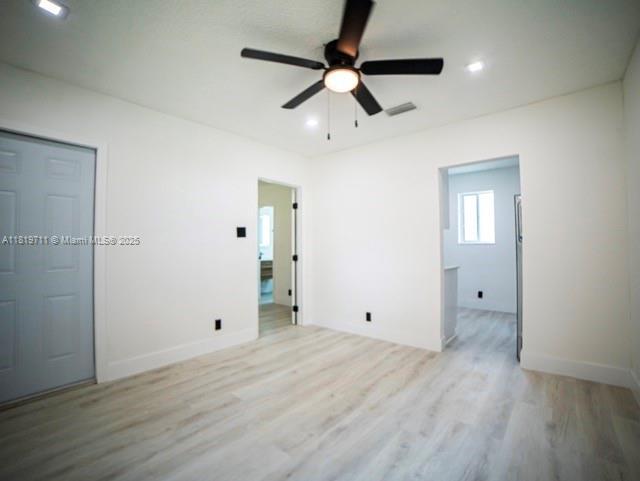 412 Columbus Pkwy, Hollywood, FL 33021 - spare room featuring wood finished floors, a ceiling fan, baseboards, and recessed lighting