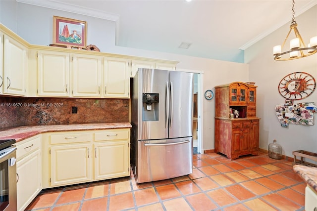 3320 Maple Ln, Davie, FL 33328 - kitchen featuring stainless steel appliances, crown molding, tasteful backsplash, a chandelier, and cream cabinets