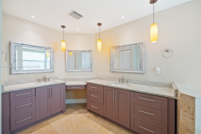3320 Maple Ln, Davie, FL 33328 - bathroom featuring two vanities and recessed lighting