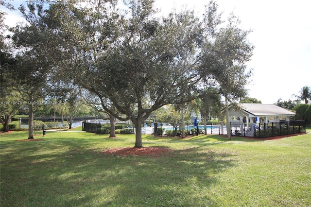3320 Maple Ln, Davie, FL 33328 - view of yard featuring a community pool