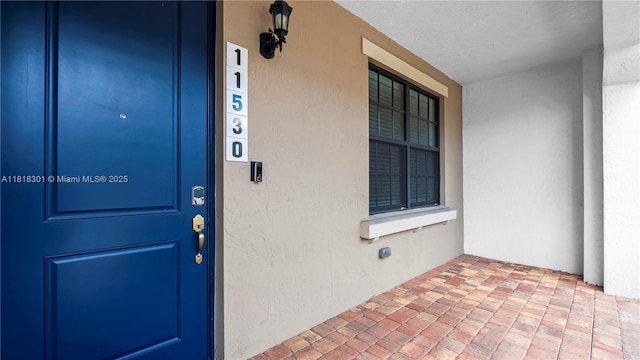 11530 SW 13th Ct, Pembroke Pines, FL 33025 - property entrance with stucco siding