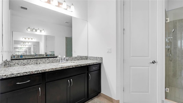 11530 SW 13th Ct, Pembroke Pines, FL 33025 - full bathroom featuring a stall shower, vanity, and baseboards