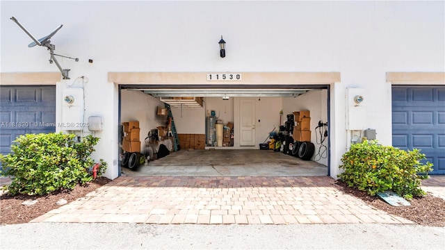 11530 SW 13th Ct, Pembroke Pines, FL 33025 - garage with decorative driveway