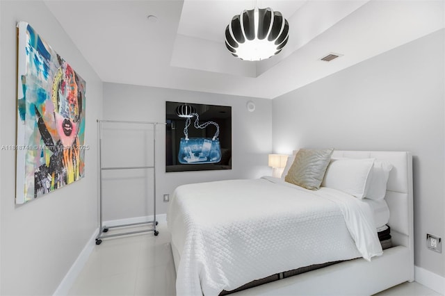 495 Brickell Ave Unit 3604, Miami, FL 33131 - bedroom with baseboards and a tray ceiling