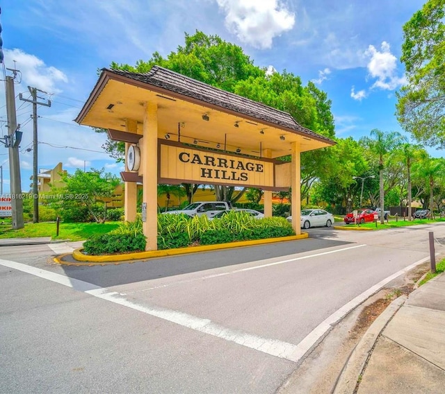 301 Cambridge Rd Unit 302, Hollywood, FL 33024 - community sign with uncovered parking
