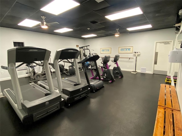 301 Cambridge Rd Unit 302, Hollywood, FL 33024 - gym featuring a drop ceiling and baseboards