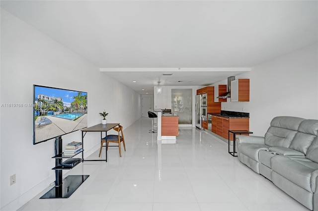 2950 NE 188th St Unit 225, Aventura, FL 33180 - living room featuring light tile patterned floors and baseboards