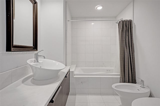 2950 NE 188th St Unit 225, Aventura, FL 33180 - full bath with a bidet, tiled shower / bath combo, vanity, tile patterned flooring, and toilet