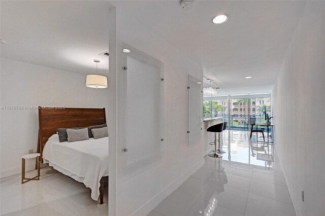 2950 NE 188th St Unit 225, Aventura, FL 33180 - bedroom featuring baseboards, recessed lighting, and light tile patterned flooring