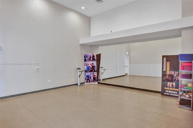 2950 NE 188th St Unit 225, Aventura, FL 33180 - garage featuring baseboards and recessed lighting