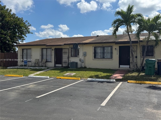 28131 SW 142nd Ct, Homestead, FL 33033 - view of front of house featuring stucco siding, uncovered parking, and cooling unit