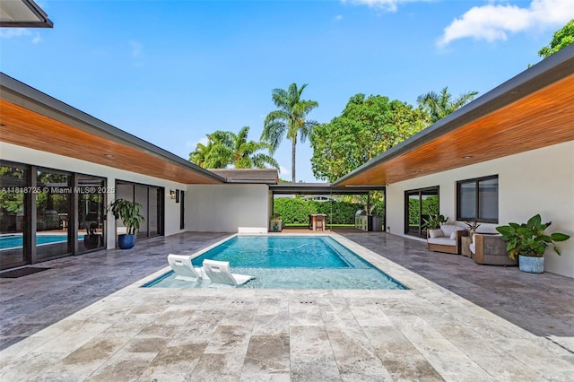 7570 SW 60th St, Miami, FL 33143 - swimming pool featuring a patio