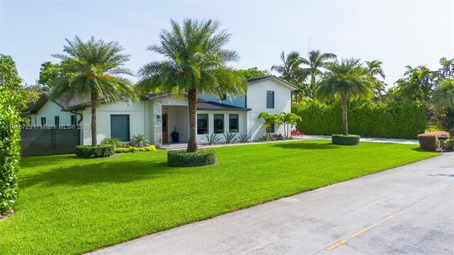 7570 SW 60th St, Miami, FL 33143 - view of front facade featuring stucco siding