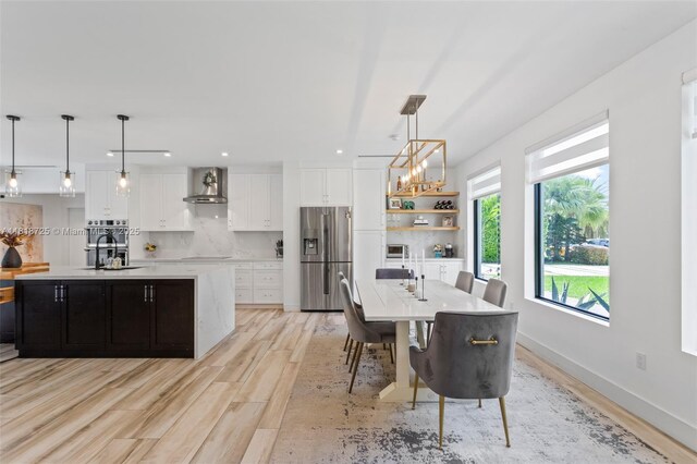 7570 SW 60th St, Miami, FL 33143 - dining area featuring light wood-style floors and recessed lighting