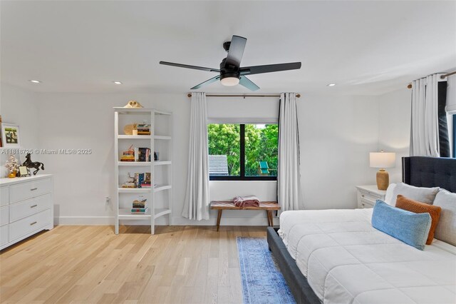 7570 SW 60th St, Miami, FL 33143 - bedroom featuring light wood-style floors, recessed lighting, ceiling fan, and baseboards