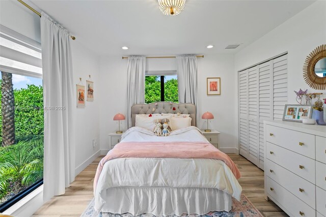 7570 SW 60th St, Miami, FL 33143 - bedroom with multiple windows, light wood-style flooring, baseboards, and recessed lighting