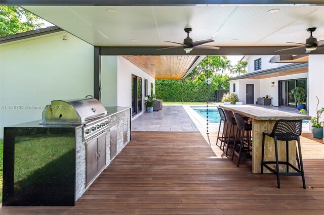 7570 SW 60th St, Miami, FL 33143 - wooden deck with ceiling fan
