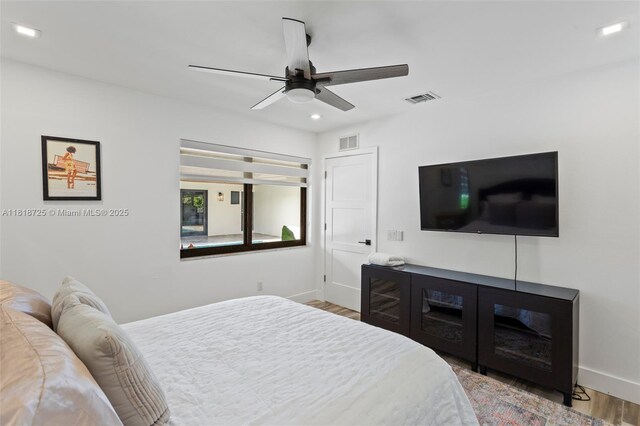 7570 SW 60th St, Miami, FL 33143 - bedroom featuring wood finished floors, baseboards, recessed lighting, and ceiling fan
