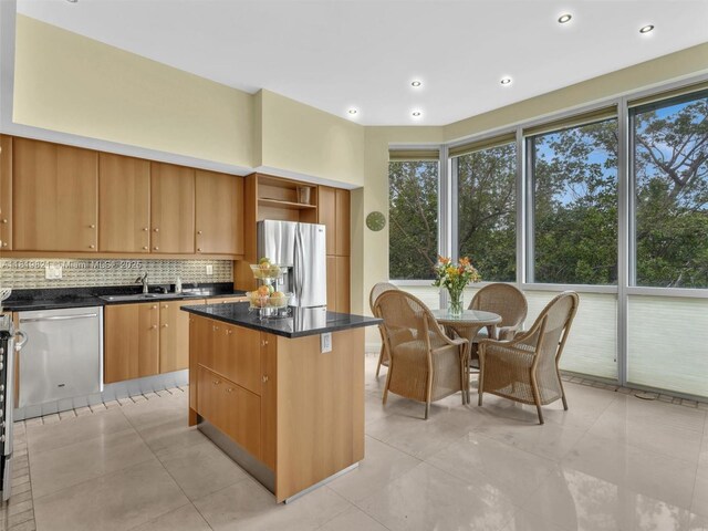 16500 Collins Ave Unit Th-10, Sunny Isles Beach, FL 33160 - kitchen featuring stainless steel appliances, backsplash, a kitchen island, open shelves, and a sink