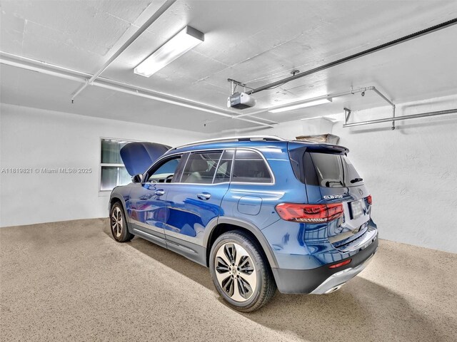 16500 Collins Ave Unit Th-10, Sunny Isles Beach, FL 33160 - garage with a garage door opener