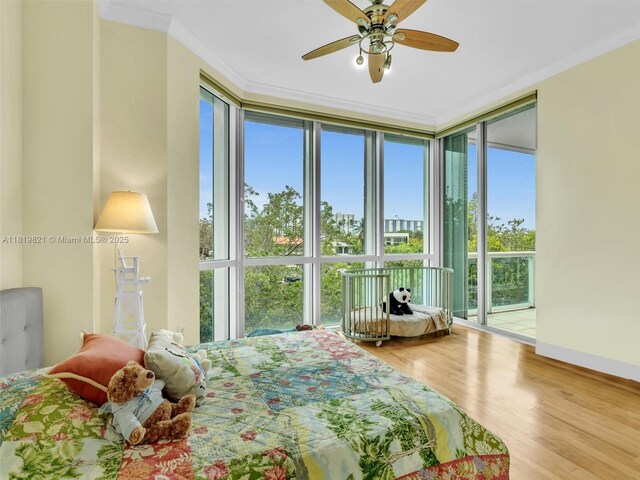 16500 Collins Ave Unit Th-10, Sunny Isles Beach, FL 33160 - bedroom with access to outside, multiple windows, wood finished floors, ornamental molding, and a ceiling fan