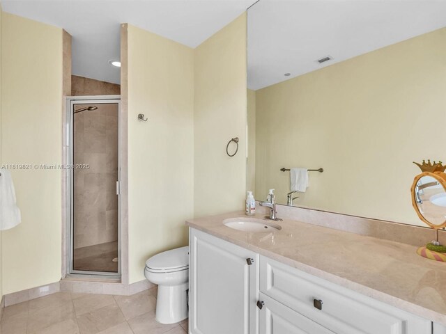 16500 Collins Ave Unit Th-10, Sunny Isles Beach, FL 33160 - full bath with toilet, vanity, a stall shower, tile patterned flooring, and baseboards