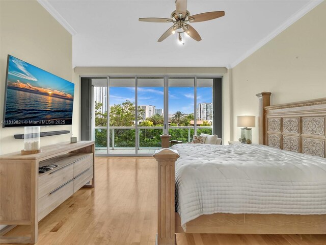 16500 Collins Ave Unit Th-10, Sunny Isles Beach, FL 33160 - bedroom with access to outside, ornamental molding, light wood finished floors, multiple windows, and a ceiling fan