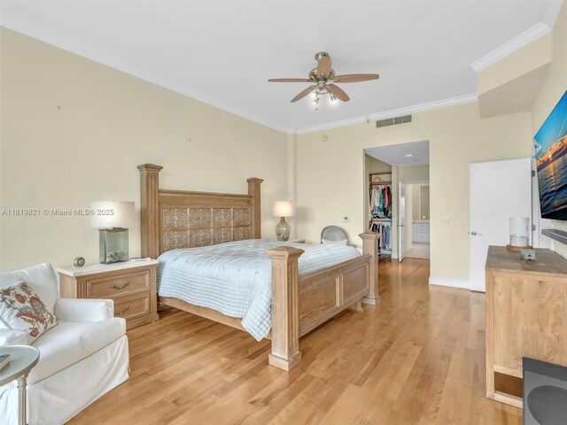 16500 Collins Ave Unit Th-10, Sunny Isles Beach, FL 33160 - bedroom with light wood-style floors, ornamental molding, ceiling fan, and baseboards