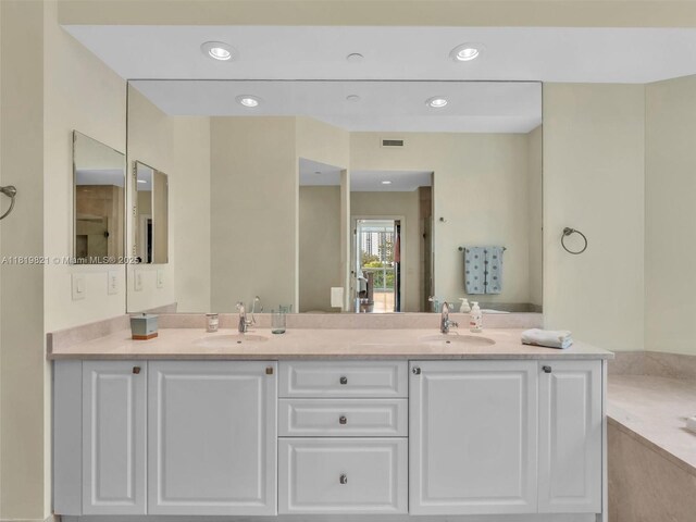 16500 Collins Ave Unit Th-10, Sunny Isles Beach, FL 33160 - bathroom with double vanity, recessed lighting, and a tub