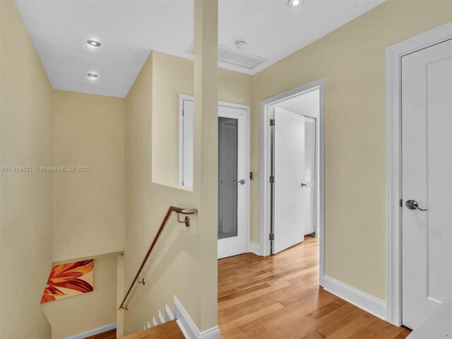16500 Collins Ave Unit Th-10, Sunny Isles Beach, FL 33160 - hall with an upstairs landing, light wood finished floors, baseboards, and recessed lighting