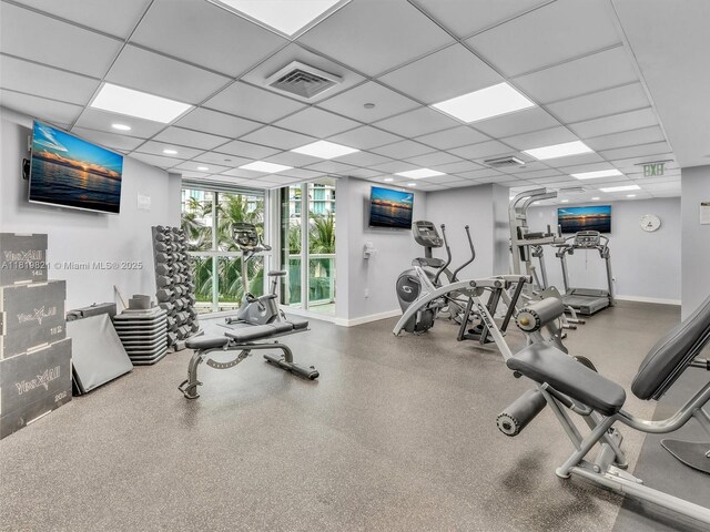 16500 Collins Ave Unit Th-10, Sunny Isles Beach, FL 33160 - workout area featuring baseboards, a drop ceiling, and floor to ceiling windows