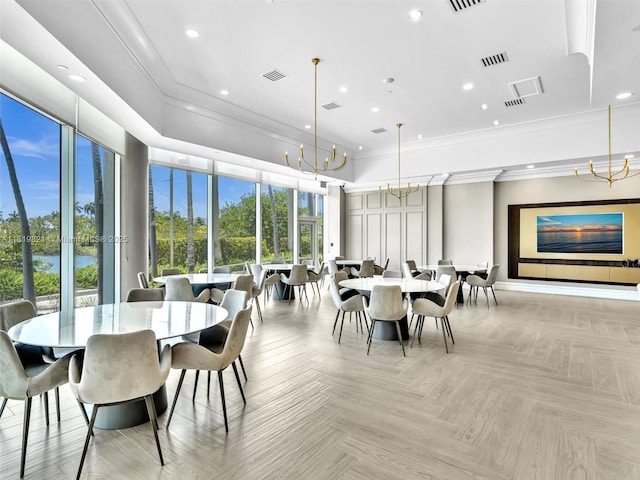 16500 Collins Ave Unit Th-10, Sunny Isles Beach, FL 33160 - dining space with a chandelier, recessed lighting, ornamental molding, a towering ceiling, and baseboards